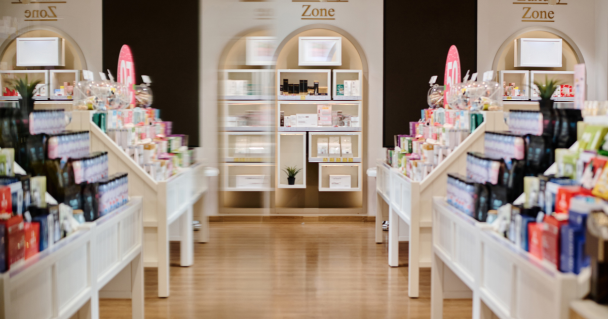 Retail cosmetics shop interior aisle